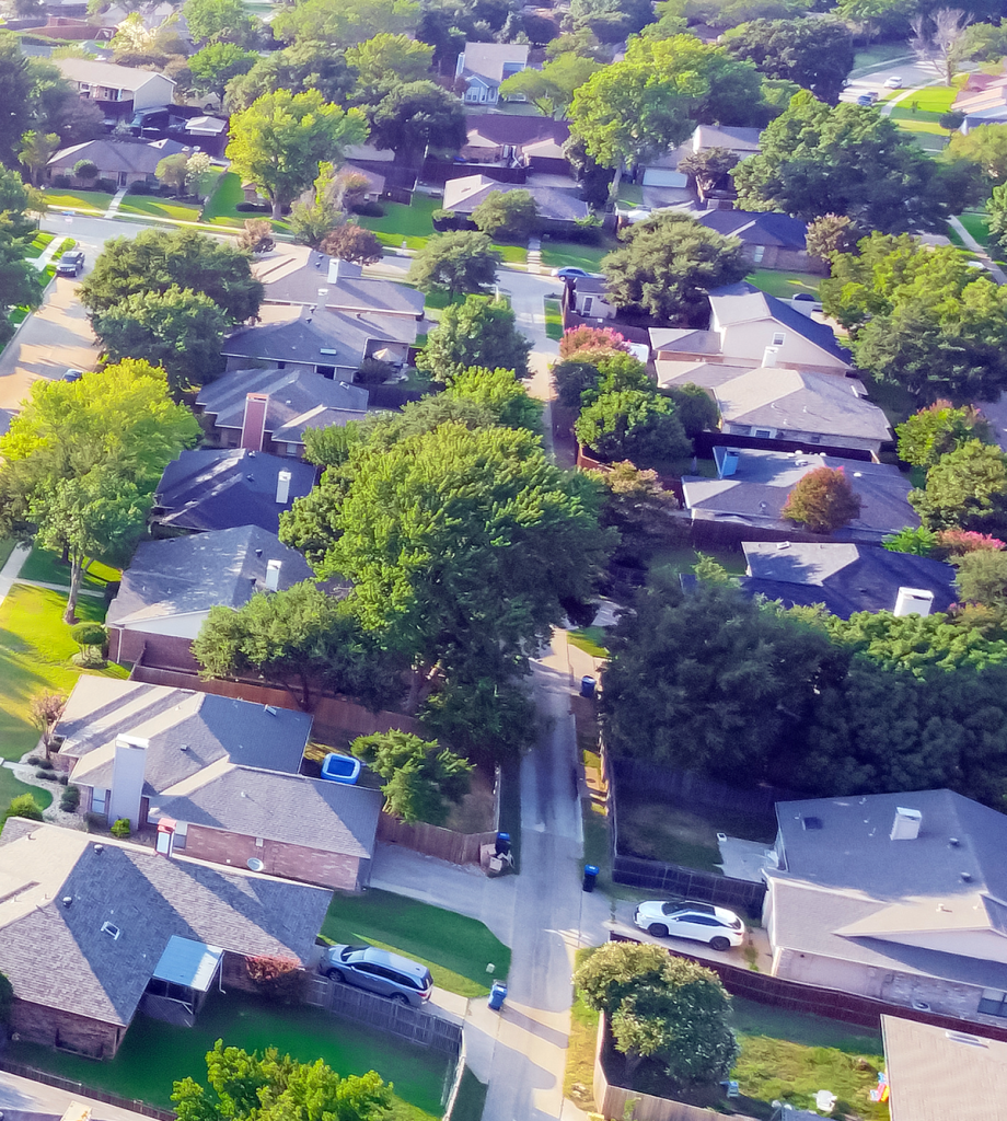 Plano Homes Sky View of Roofs by Cook DFW Roofing & Restoration