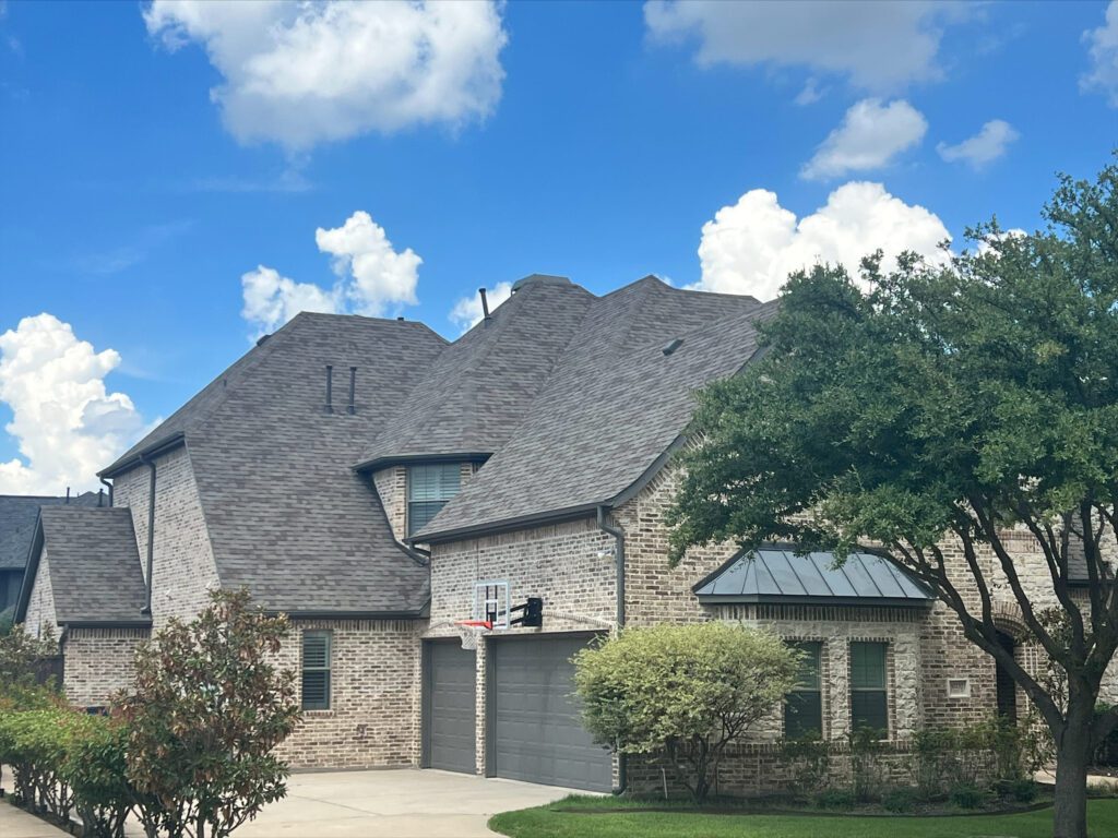 Finished house roof project by Cook DFW